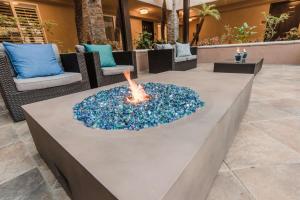 a fire pit in the lobby of a hotel at Best Western Plus Manhattan Beach Hotel in Manhattan Beach