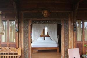 Postel nebo postele na pokoji v ubytování Ogek Home Stay