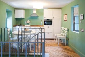 Kuchyňa alebo kuchynka v ubytovaní Isola Bella Apartments - Via Villa 9