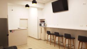 Kuchyň nebo kuchyňský kout v ubytování Gravitas Hostel