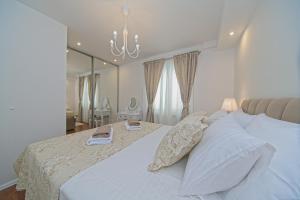 Ένα ή περισσότερα κρεβάτια σε δωμάτιο στο Apartment Marangun