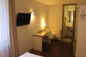 TV a/nebo společenská místnost v ubytování Altstadt Hotel Baunachshof