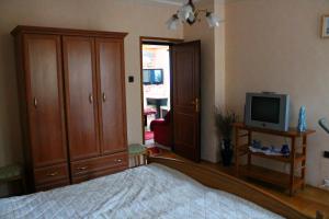 TV a/nebo společenská místnost v ubytování Ibolya Apartmanok