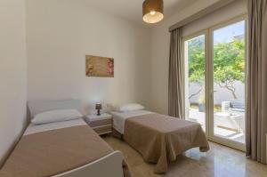 A bed or beds in a room at La Rosa Dei Venti