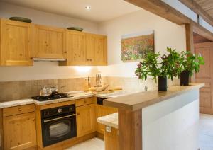 Η κουζίνα ή μικρή κουζίνα στο Petite Savoyarde - Chamonix +11 φωτογραφίες