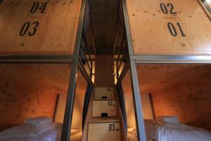 Postel nebo postele na pokoji v ubytování Wise Owl Hostels Shibuya