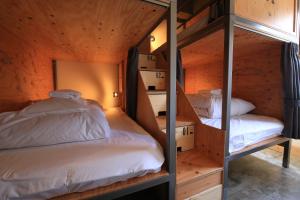 Postel nebo postele na pokoji v ubytování Wise Owl Hostels Shibuya