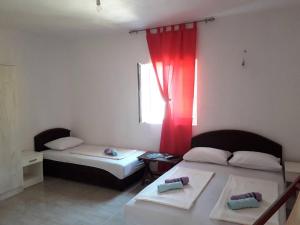Postel nebo postele na pokoji v ubytování Apartmani Andrea-jaz