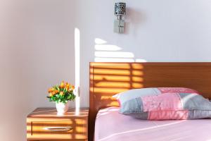 Postel nebo postele na pokoji v ubytování Apartments Aga