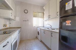 Kuchyň nebo kuchyňský kout v ubytování Apartamento La Dama de Cadiz + 6 fotografií