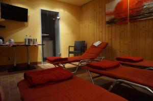 TV a/nebo společenská místnost v ubytování Hotel am Tierpark