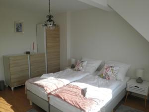 Postel nebo postele na pokoji v ubytování Apartament Esja