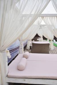 Ένα ή περισσότερα κρεβάτια σε δωμάτιο στο FG Dzherelo S