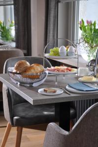 a table with plates of food on top of it at Landgasthof Eiserner Ritter in Boppard