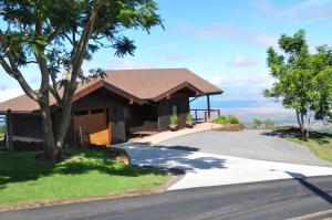 a house on the side of a road at Kula 4200 in Kula