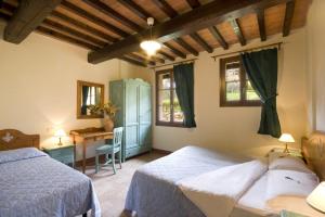 Ένα ή περισσότερα κρεβάτια σε δωμάτιο στο Agriturismo eco-bio Belmonte Vacanze +131 φωτογραφίες