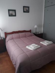 Una cama o camas en una habitación de Apartamento Lautaro