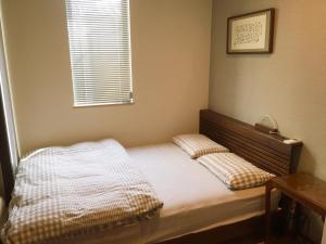 Postel nebo postele na pokoji v ubytování Mini inn Nara- - - 英語予約限定