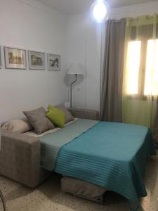 Postel nebo postele na pokoji v ubytování Casa de Corralón