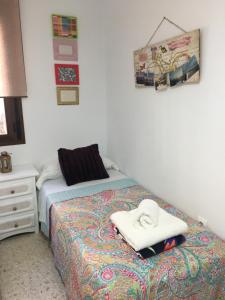 Postel nebo postele na pokoji v ubytování Casa de Corralón