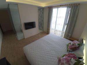 Letto o letti in una camera di ING Spa B&B