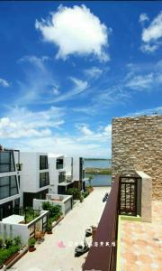 a view from the balcony of a apartment building at ING Spa B&B in Magong