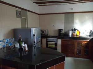 Kuchyň nebo kuchyňský kout v ubytování Sea Breeze Villas Kenya