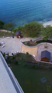 an aerial view of a house next to the water at McFarlane's Place in Ocho Rios
