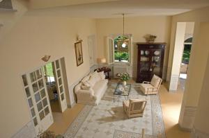 an aerial view of a living room with a couch and chairs at Villa Signori in Marina di Pietrasanta