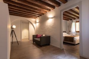 A bed or beds in a room at Il Pozzo Magico