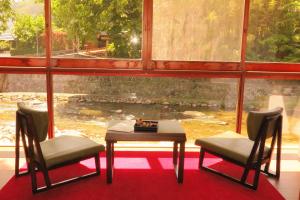 Coin salon dans l'établissement OkutsuHotSpa IkedayaKajikaen