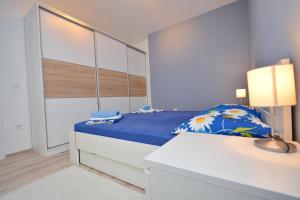 Posteľ alebo postele v izbe v ubytovaní Apartment Pan
