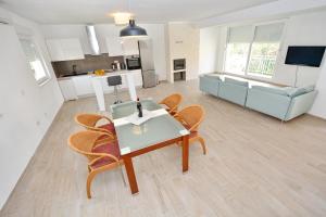 Kuchyňa alebo kuchynka v ubytovaní Apartment Pan
