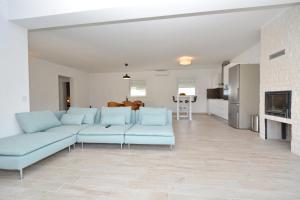 Televízia a/alebo spoločenská miestnosť v ubytovaní Apartment Pan