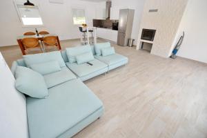 Televízia a/alebo spoločenská miestnosť v ubytovaní Apartment Pan