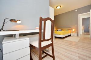 Posteľ alebo postele v izbe v ubytovaní Apartment Pan