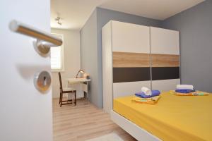Posteľ alebo postele v izbe v ubytovaní Apartment Pan