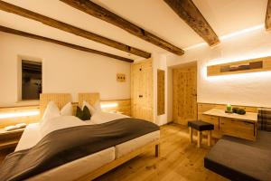 Postelja oz. postelje v sobi nastanitve Hotel Restaurant Waldbichl