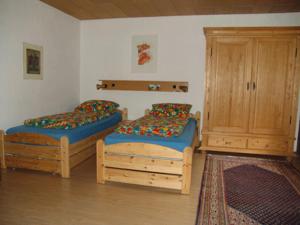 Кровать или кровати в номере Römerklause