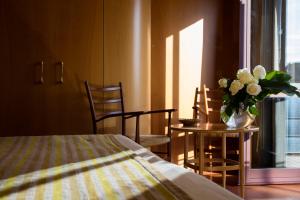 Postel nebo postele na pokoji v ubytování Hotel dei Duchi