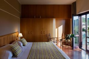 Postel nebo postele na pokoji v ubytování Hotel dei Duchi