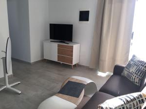 Telewizja i/lub zestaw kina domowego w obiekcie Los Gracioseros 118 & 202