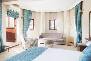 Кровать или кровати в номере Meryem's Hotel