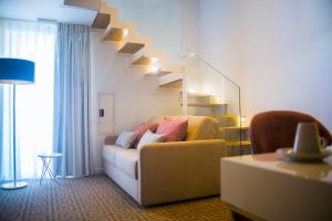 Uma área de estar em Thomar Boutique Hotel