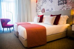 Cama ou camas em um quarto em Thomar Boutique Hotel