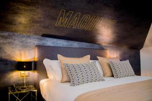Cama ou camas em um quarto em Thomar Boutique Hotel