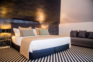 Cama ou camas em um quarto em Thomar Boutique Hotel