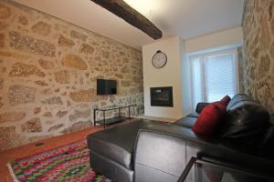 TV a/nebo společenská místnost v ubytování Casa Roupar by Gerês Casas