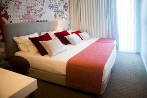 Cama ou camas em um quarto em Thomar Boutique Hotel
