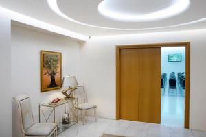 Posezení v ubytování Karalis City Hotel